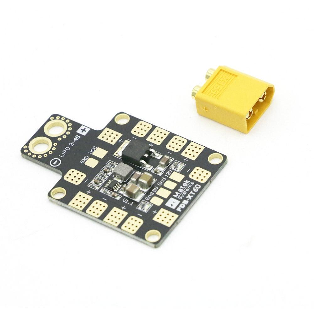 Matek Systems PDB XT60 W/ BEC 5V & 12V 2oz Copper Drone Power Distribution Board For RC Helicopter FPV Quadcopter Muliticopter 2 Matek Systems PDB XT60 W/ BEC 5V & 12V 2oz Copper Drone Power Distribution Board For RC Helicopter FPV Quadcopter Muliticopter - صورة Matek Systems PDB XT60 W/ BEC 5V & 12V 2oz Copper Drone Power Distribution Board For RC Helicopter FPV Quadcopter Muliticopter - صورة 2