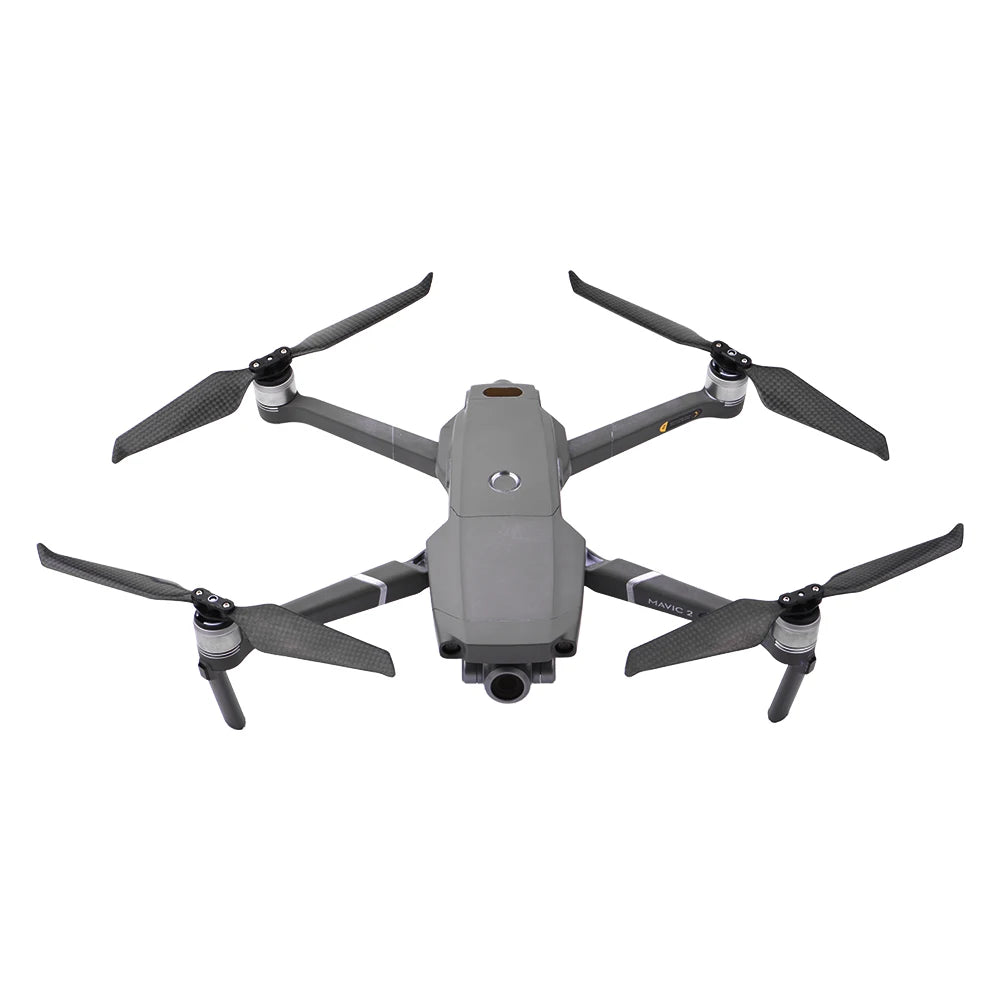 carbon fibre props produce less vibration due to its stiffness . it sounds quieter compare